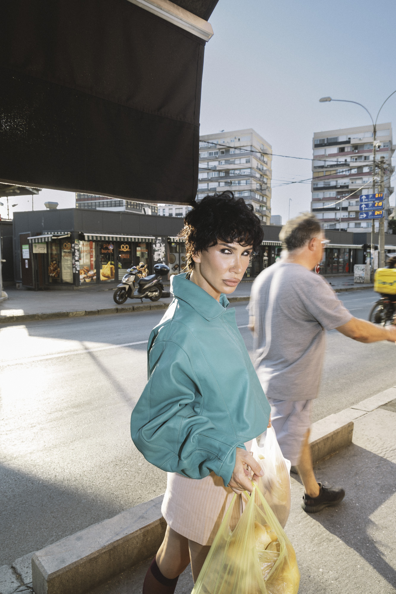 Street portrait with grocery bags, part of the B/ROLL series