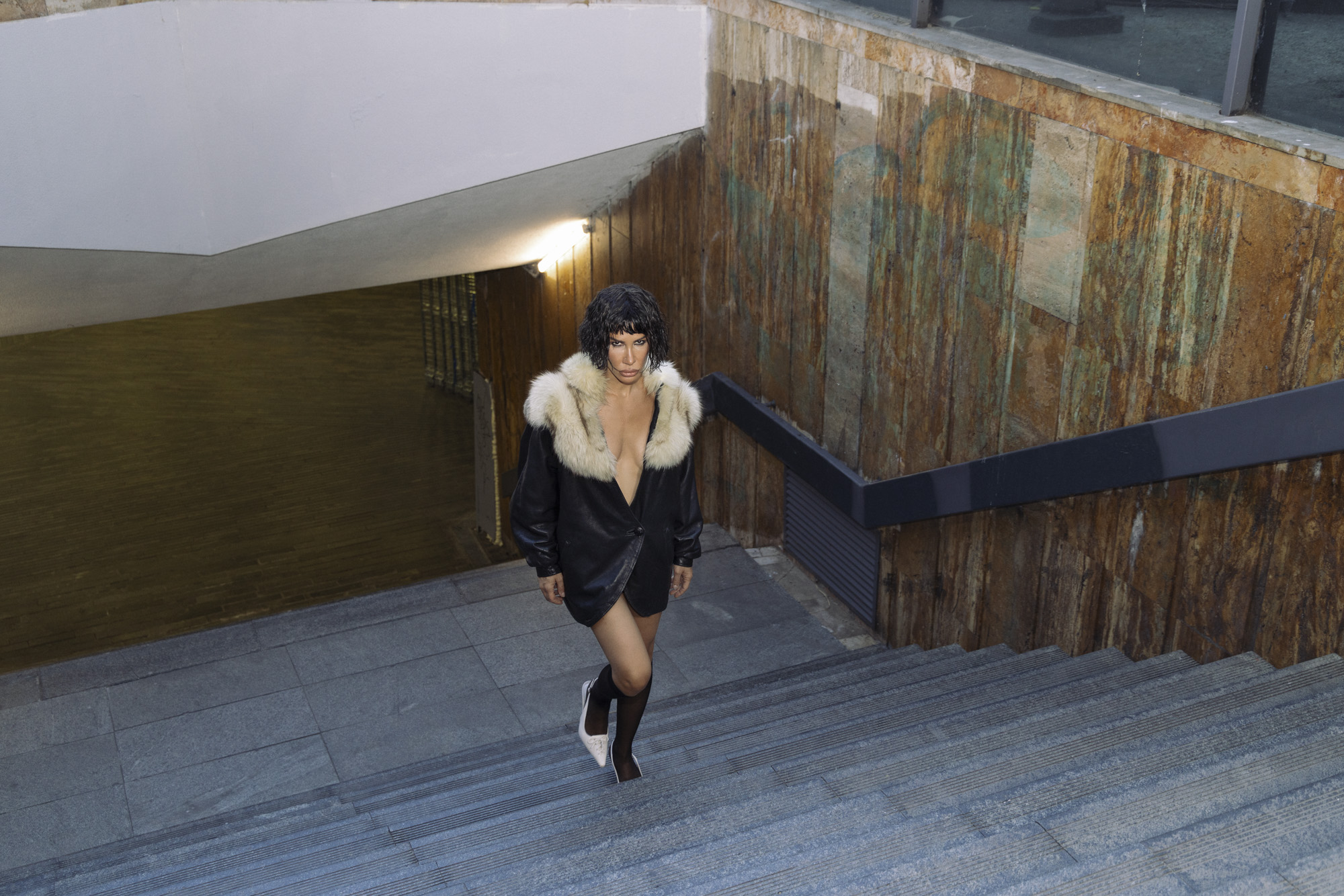 Portrait descending stairs, part of the B/ROLL series